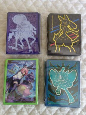 (k)	Lot of 4 NIP 65 count ea POKEMAN Trading Card Sleeves